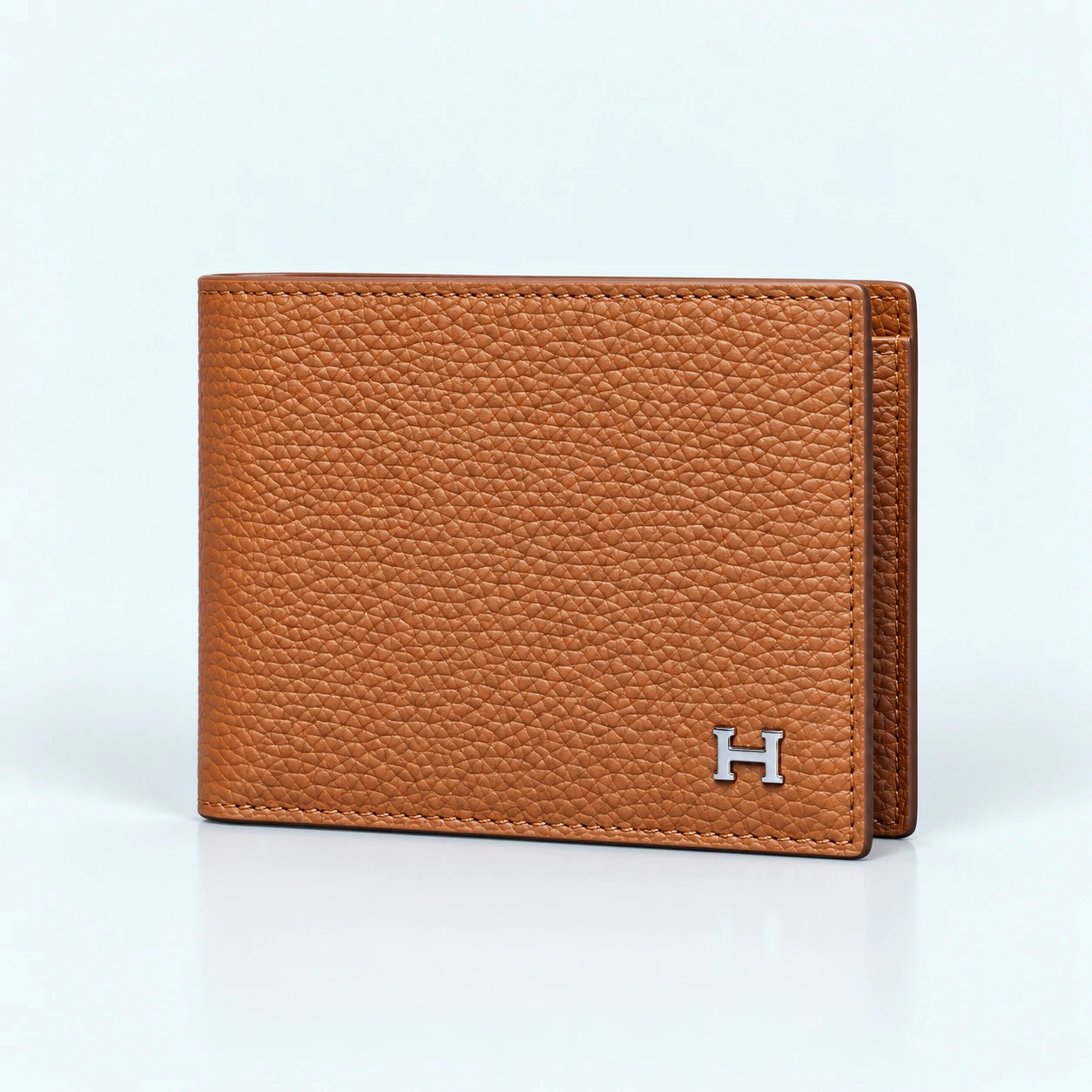 ChatGPT Image Sep 21, 2026, 07_56_04 PM Hermès MC² Compact Wallet – Orange Epsom Leather, 8 Card Slots Brown 522 - Image 1